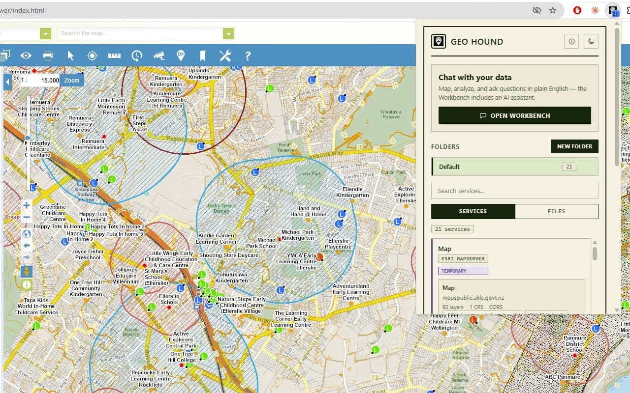 The Geo Hound popup over a street map, listing the GIS services detected on the page in a folder with a count of twenty-one services and a search box.